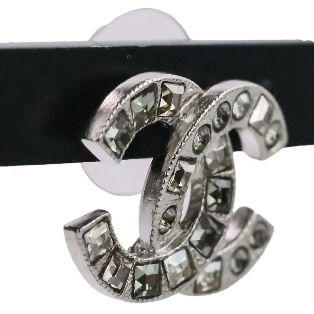 CHANEL Silver Logo Earrings